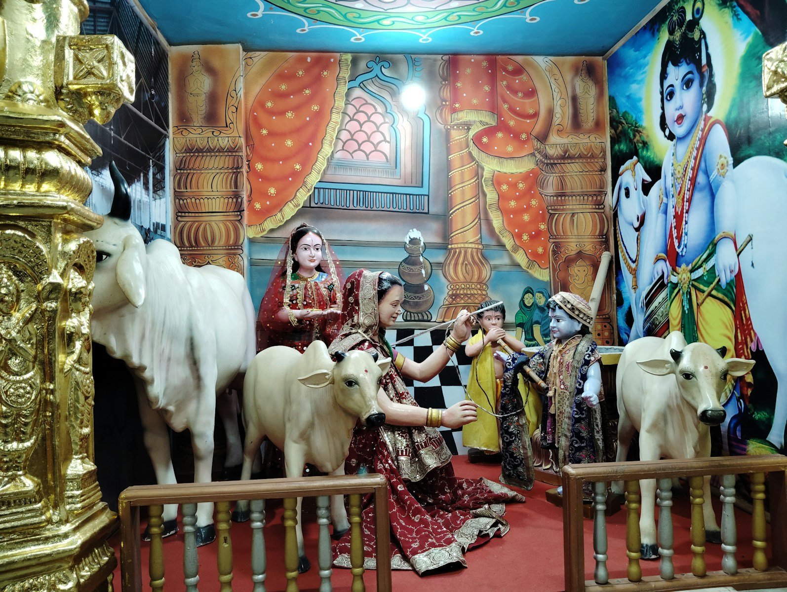 A group of people in a room with animals